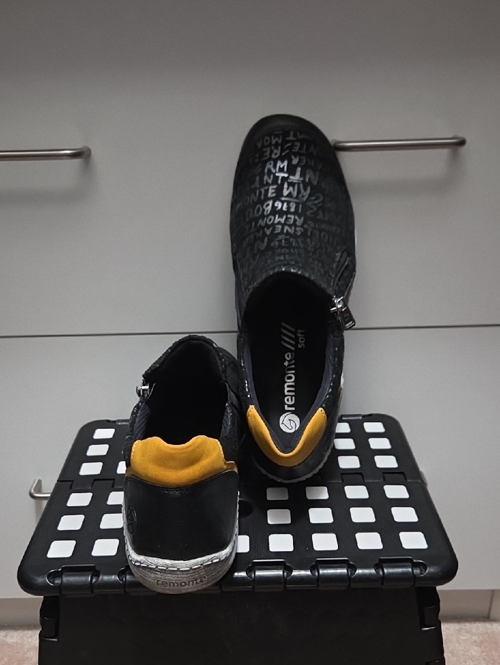 Remonte Black Slip-On Shoes with Yellow Heel Collar